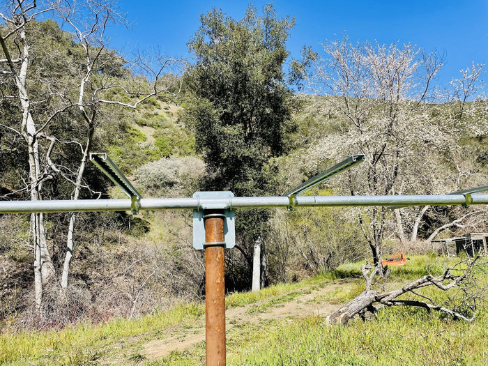 Top of pole mount with horizontal pipe and panel rails before the panels go on